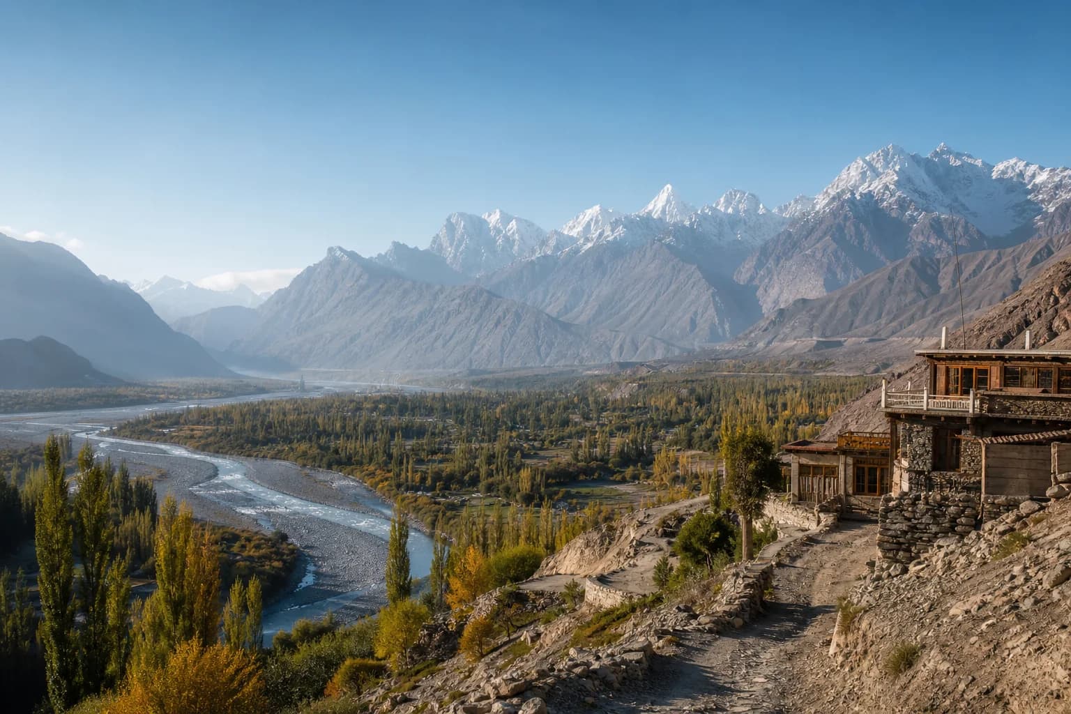 Art-directed view of a cultivated valley, river, villages and Karakoram mountains representing the Skardu and Shigar journey